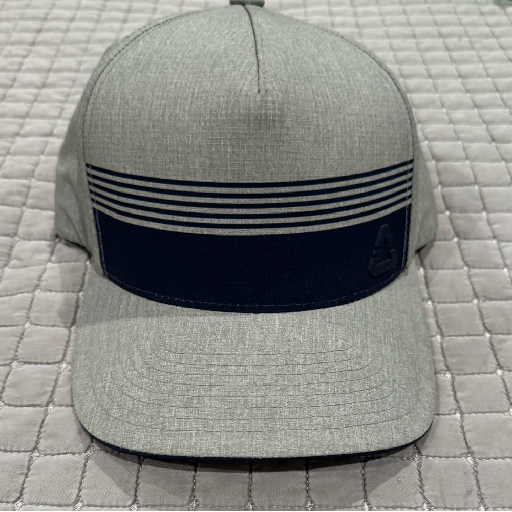 Travis Mathew Gray and Blue Hat Modern Design